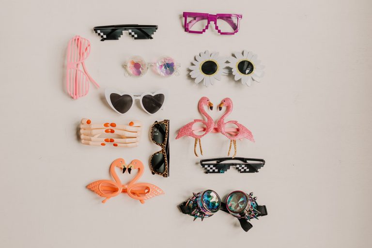 collection of glasses for photo booth props for any wedding or event