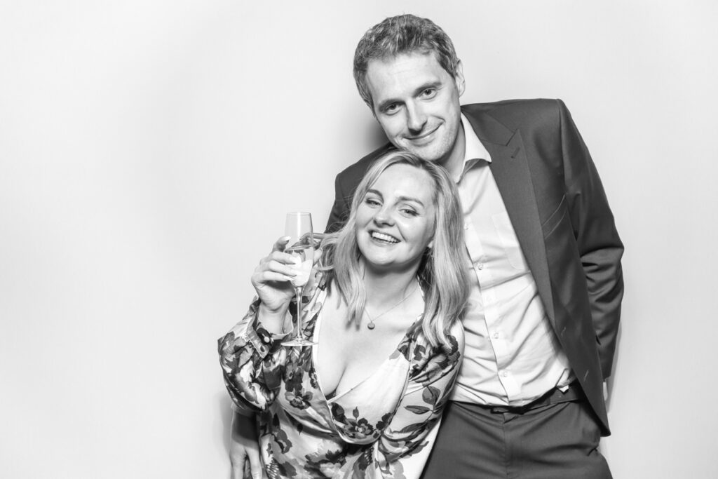 black and white portrait of guests during corporate event posing for Gloucester photo booth hire for weddings and corporate events