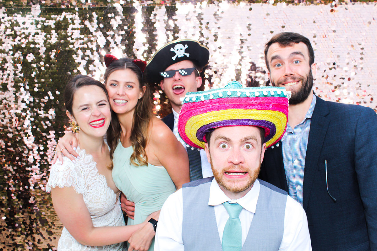 guests at Lapstone Barn Wedding for mad hat photo booth