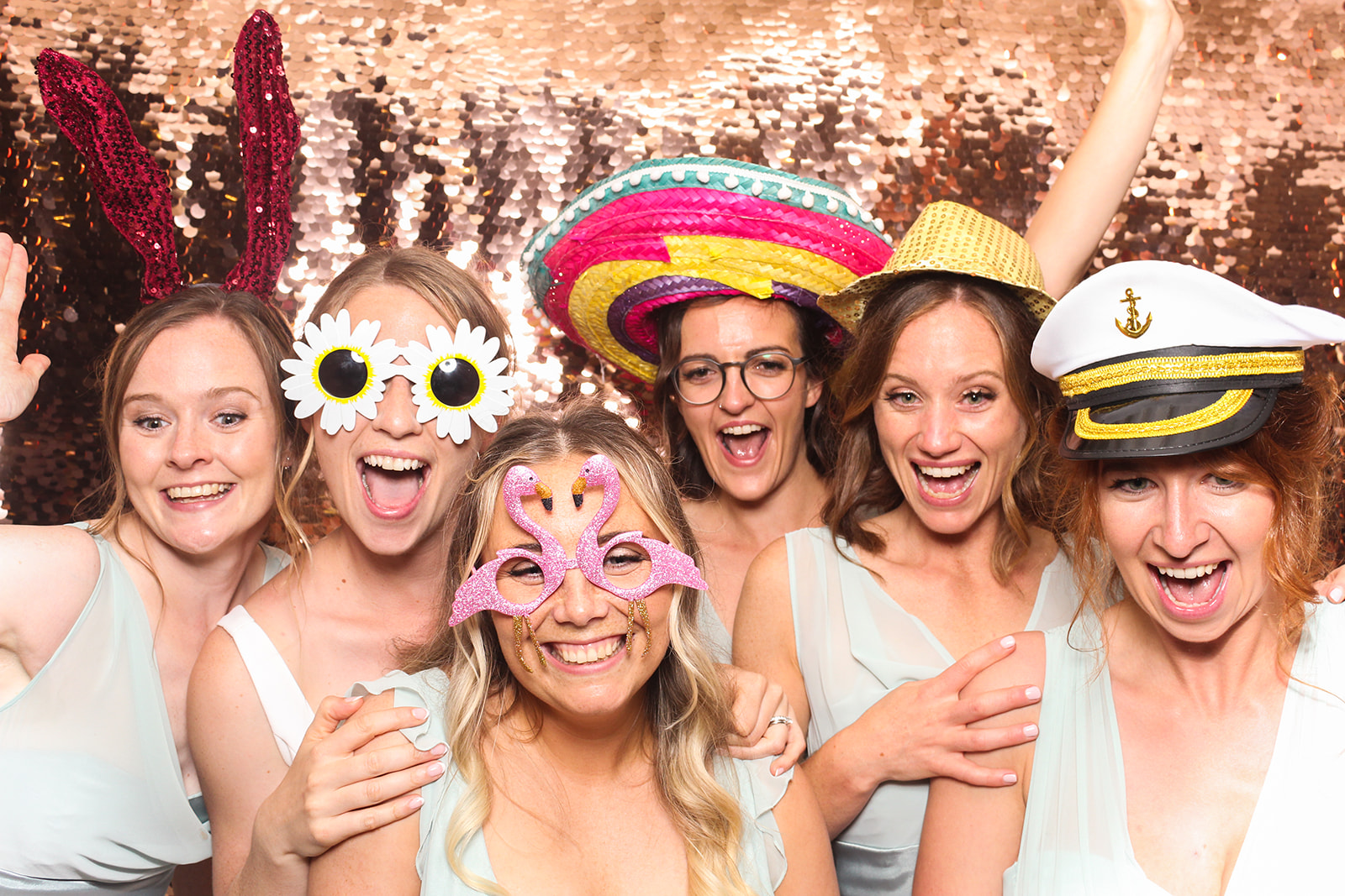 girls posing during a photo booth event in the cotswolds