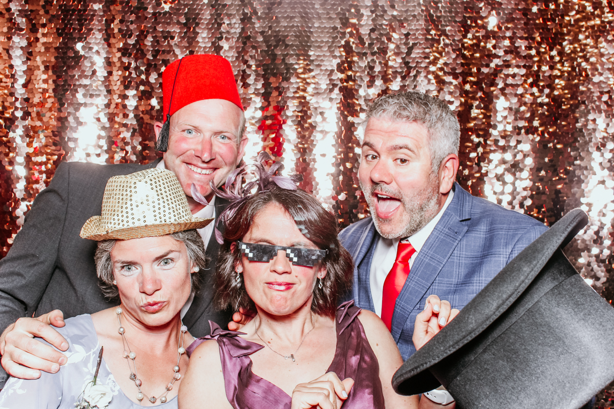 sequins backdrop for this photo booth setup during a wedding in Gloucestershire 