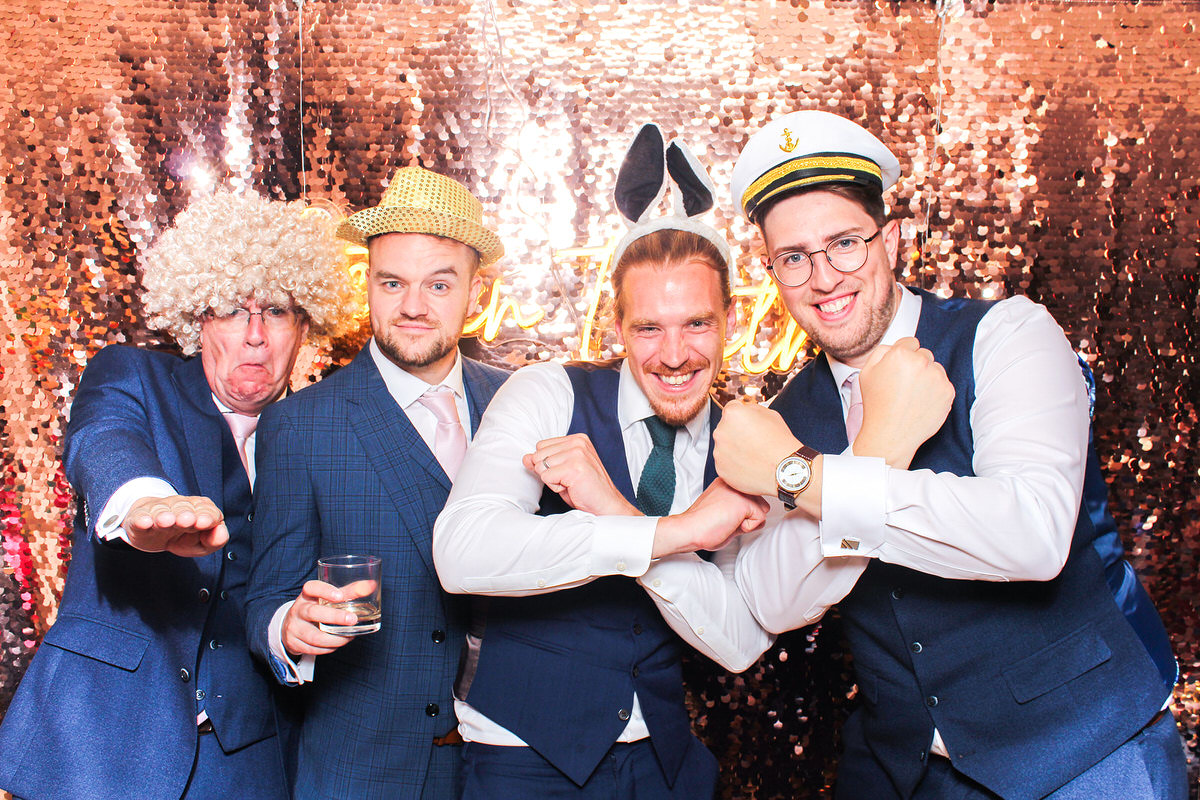 guys posing for our cotswolds photo booth at hyde house wedding venue