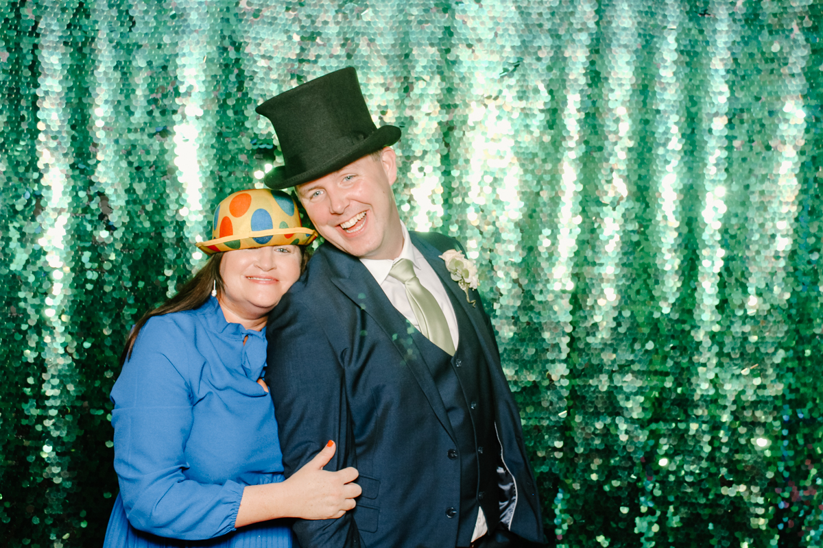 sweet portraits with green sequins backdrop for cotswolds photo booth 