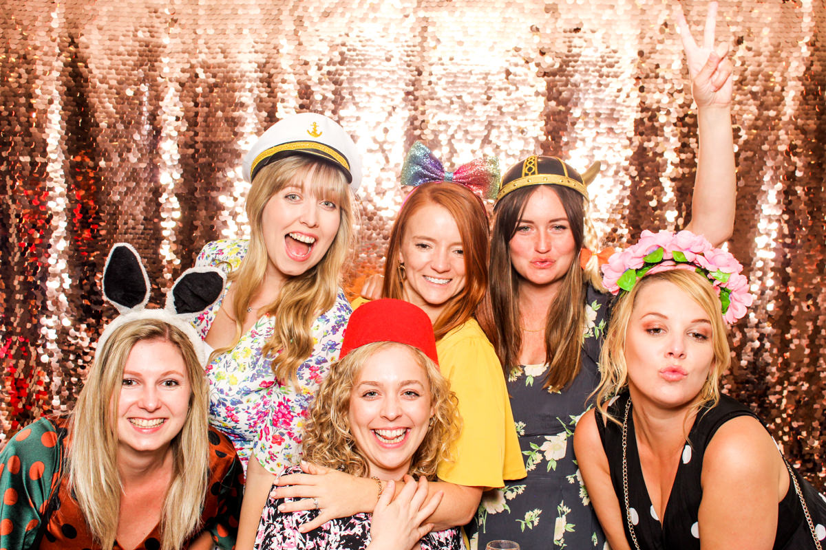 fun wedding party for a capstone barn wedding with mad hat photo booth supplier