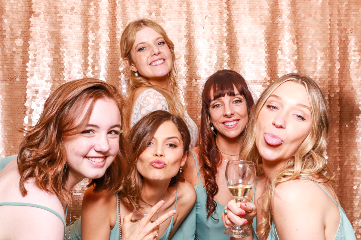 bridesmaids posing for a lapstone barn wedding 