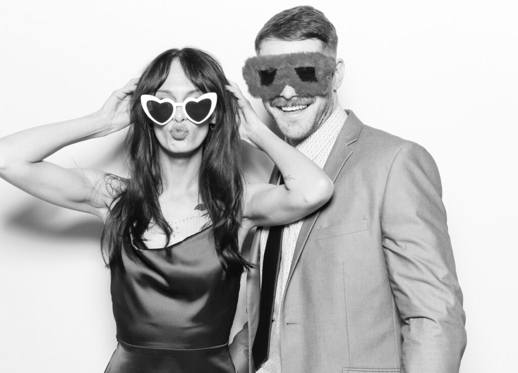 black and white portrait of a couple posing for a Gloucestershire based photo booth rental