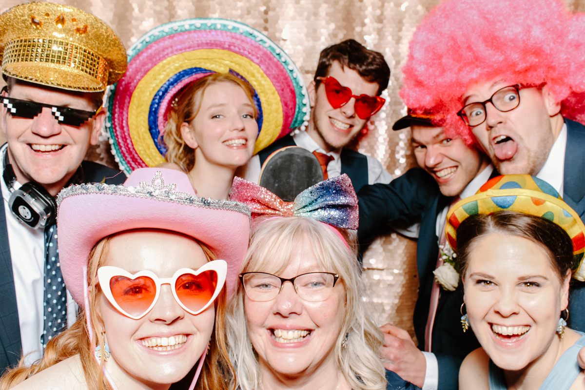 large group during photo booth event for a cotswolds wedding
