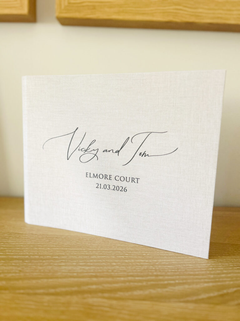 custom guest book for photo booth prints with couples names and venue and date on
