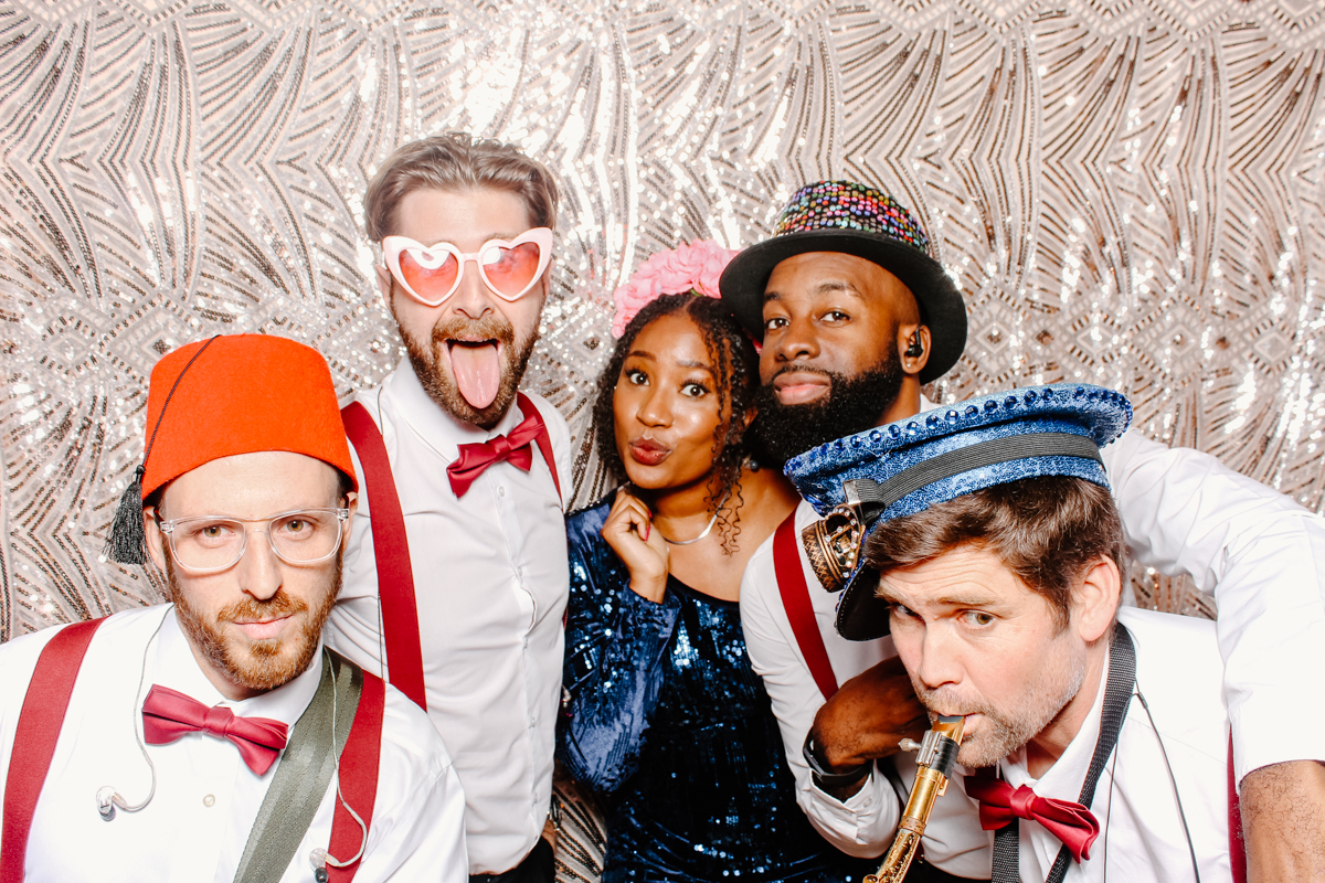 wedding band posing during a wedding reception photo booth hire elmore court
