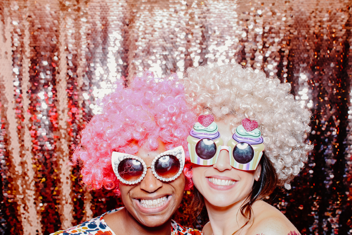 guests with wigs during a photo booth at Hyde House
