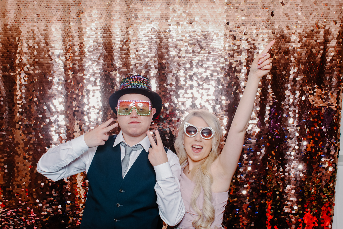 couple during a photo booth event at Lapstone Barn