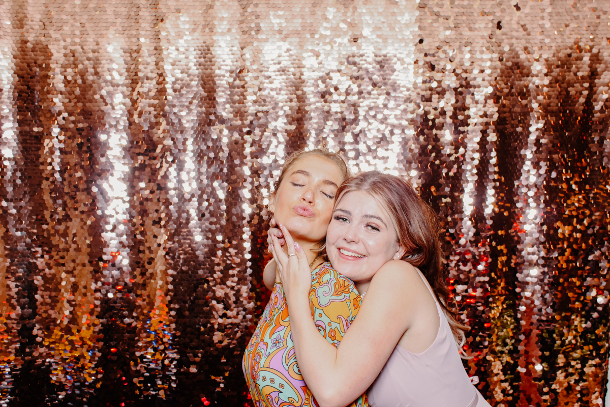 cotswolds wedding reception entertainment with sequins backdrop