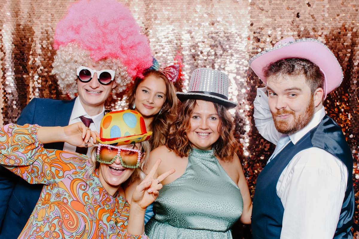 guests posing during a lapstone barn wedding reception