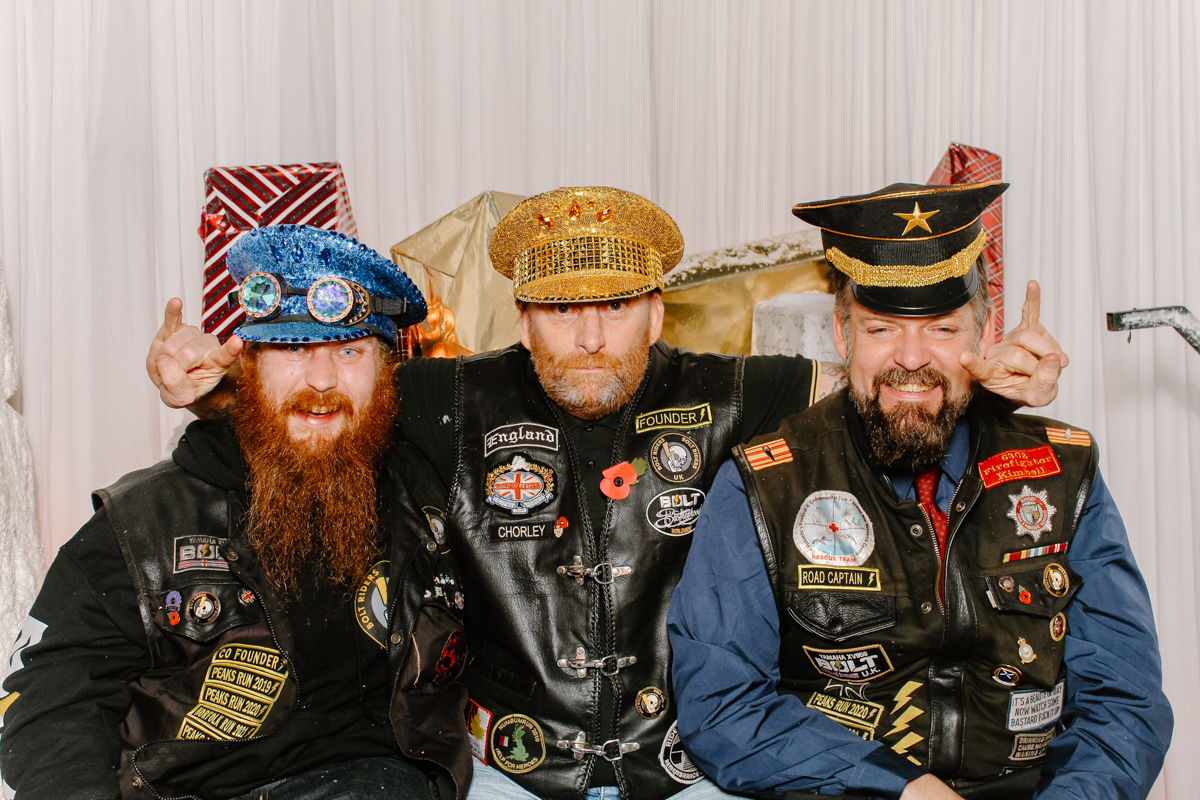bikers wearing sequins hats during a christmas themed wedding