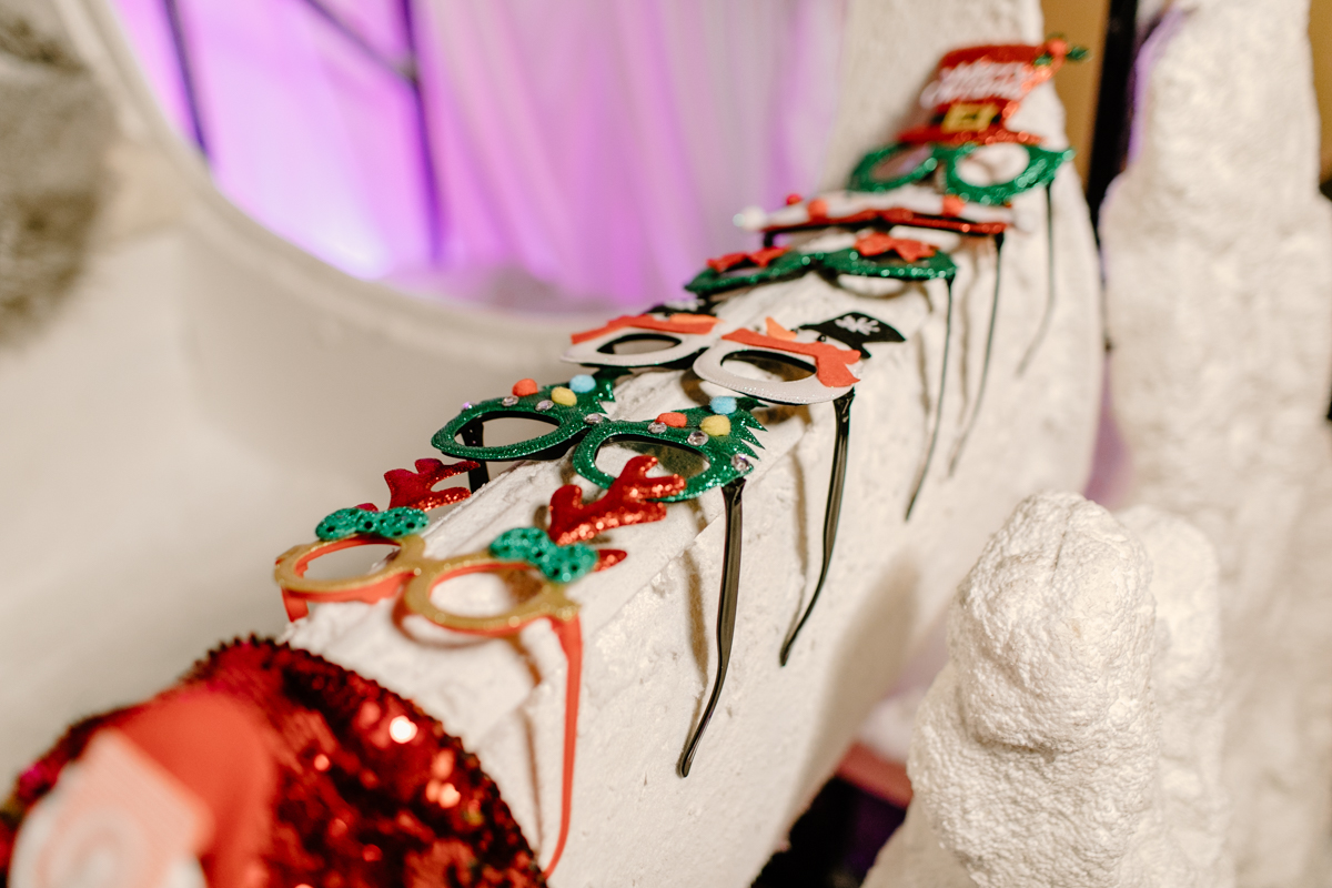 christmas props on a white sledge for a photo booth hire cotswolds