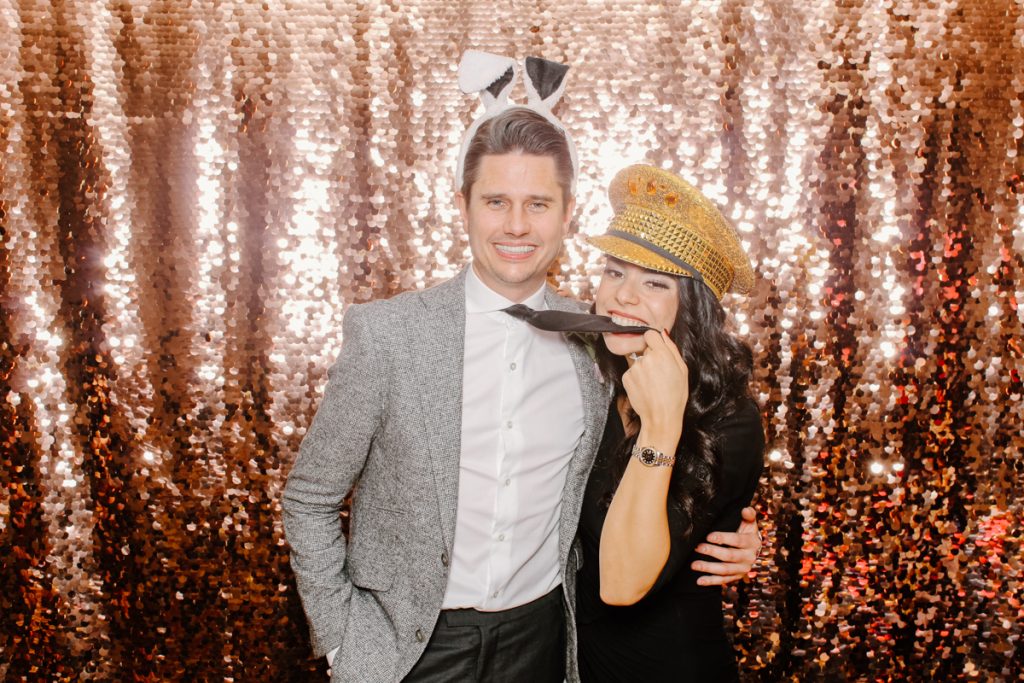 a couple wearing funny props during a reception party entertainment near Solihull 