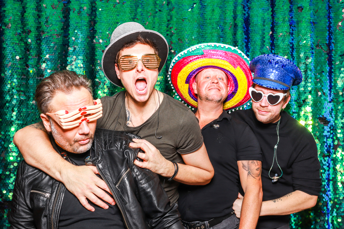 band posing for a wedding photo booth hire cotswolds