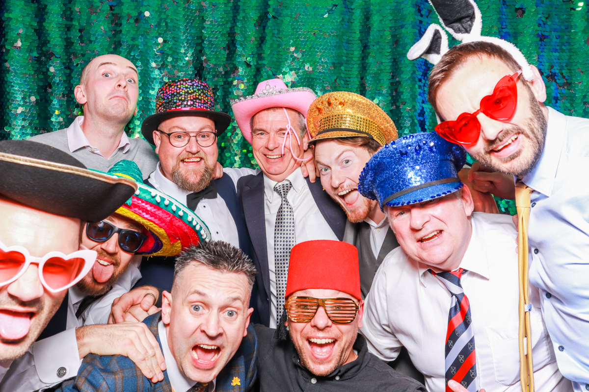 large group of people during a wedding photo booth hire 