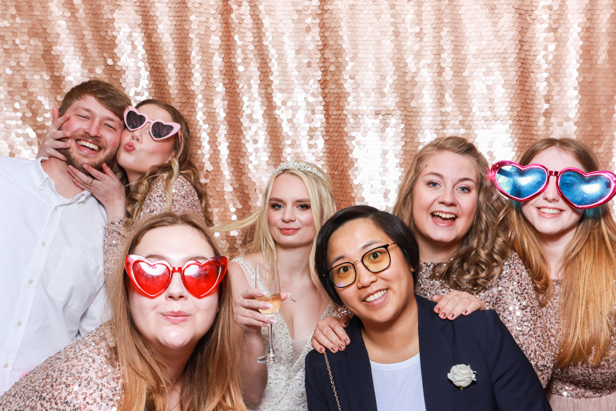 guests using the photo booth hire during a wedding party