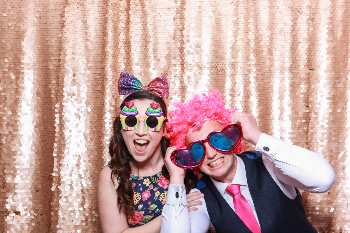 guests using the photo booth during ardington house wedding