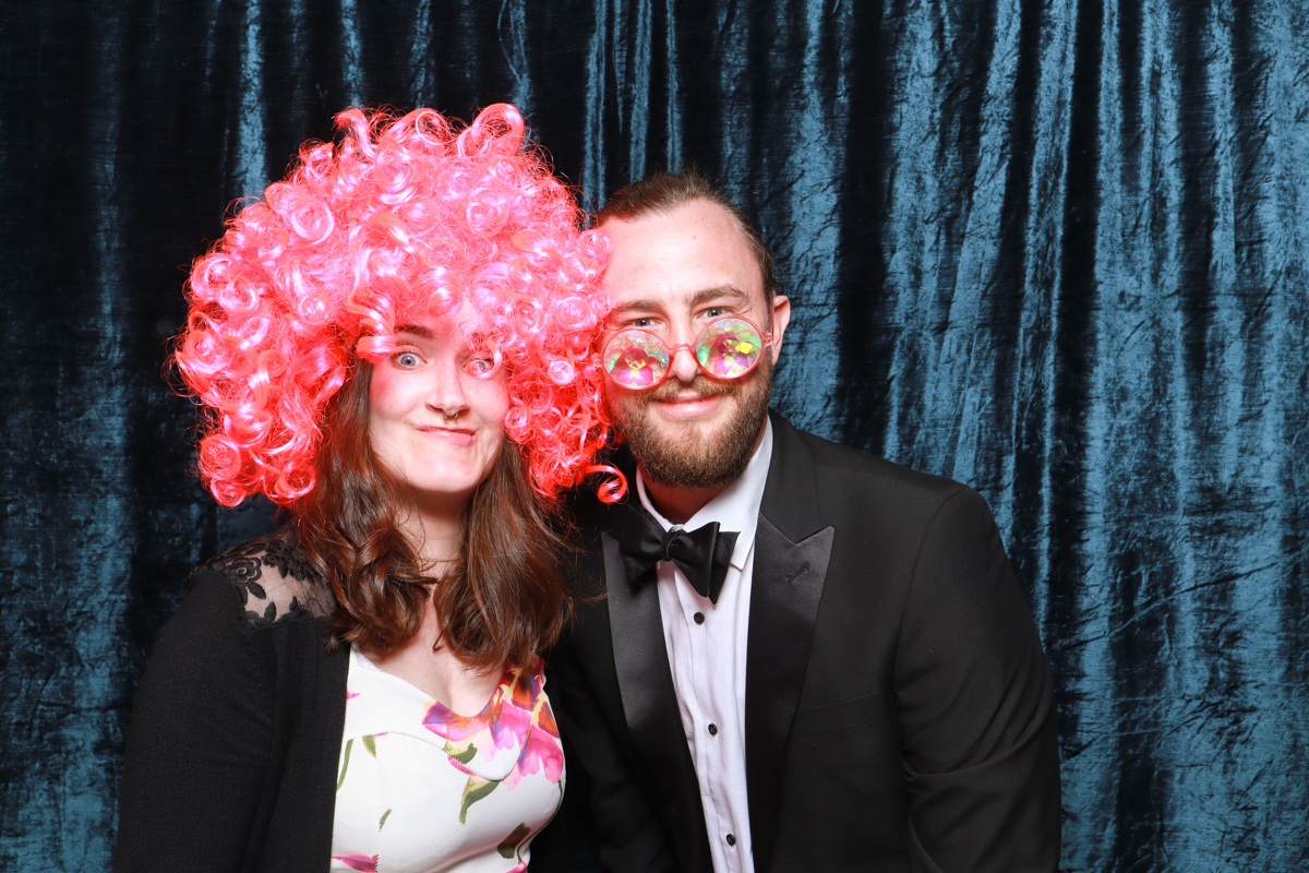 blue velvet backdrop for cotswolds wedding at Eastington Park