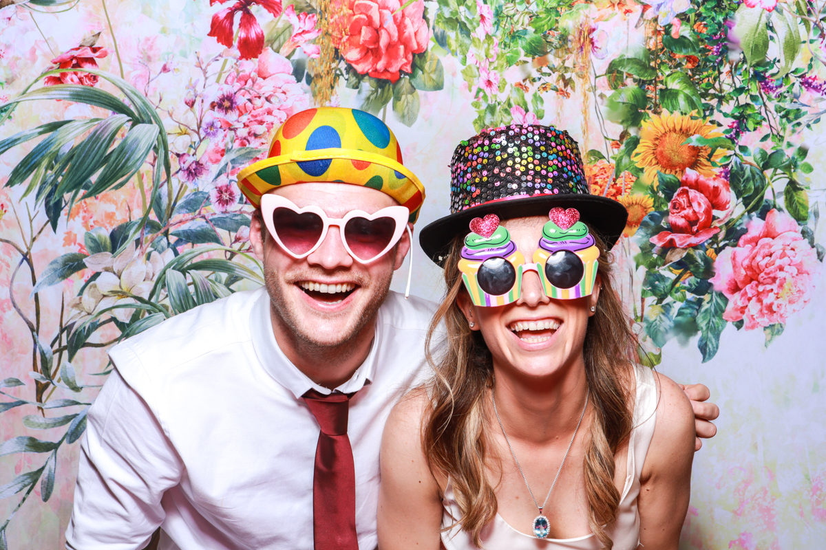 fun guests having the best time at elmore court for the photo booth hire