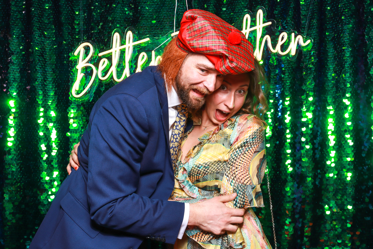 couple posing for cotswolds based photo booth during a wedding at norton grounds