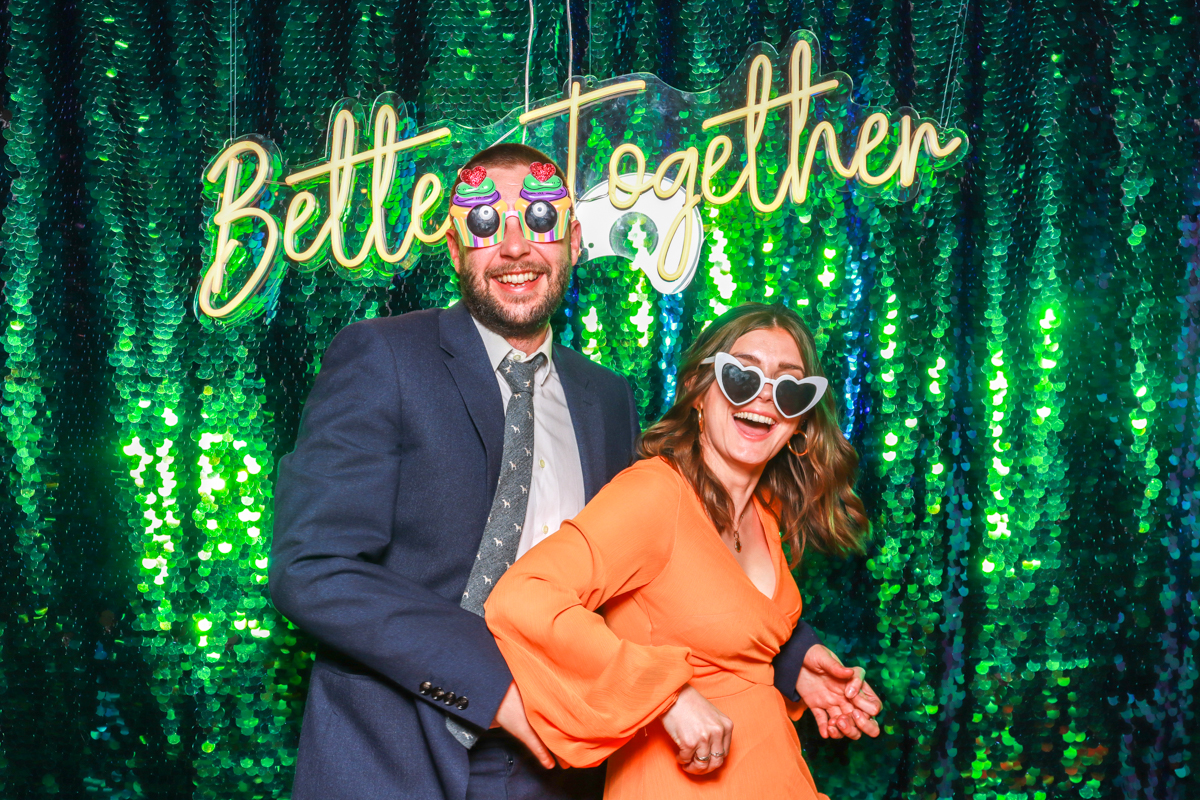 neon sign during a photo booth party wedding entertainment