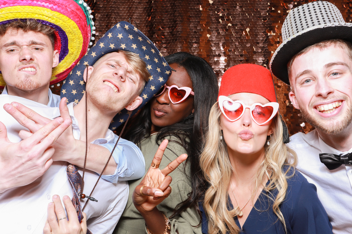 wedding guests posing for cotswolds photo booth hire