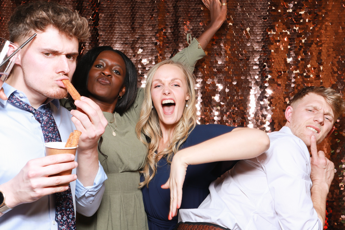 guests using the photo booth during an old gore wedding