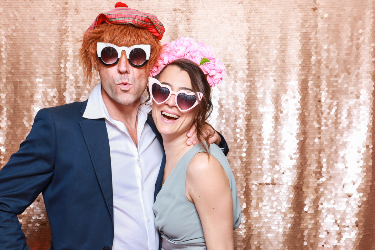 blush sequins backdrop for a tetbury photo booth party during the wedding reception