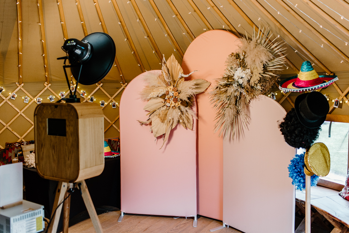 Thorpe Gardens Wedding Photo Booth setup with modern arches and dried flower arrangements