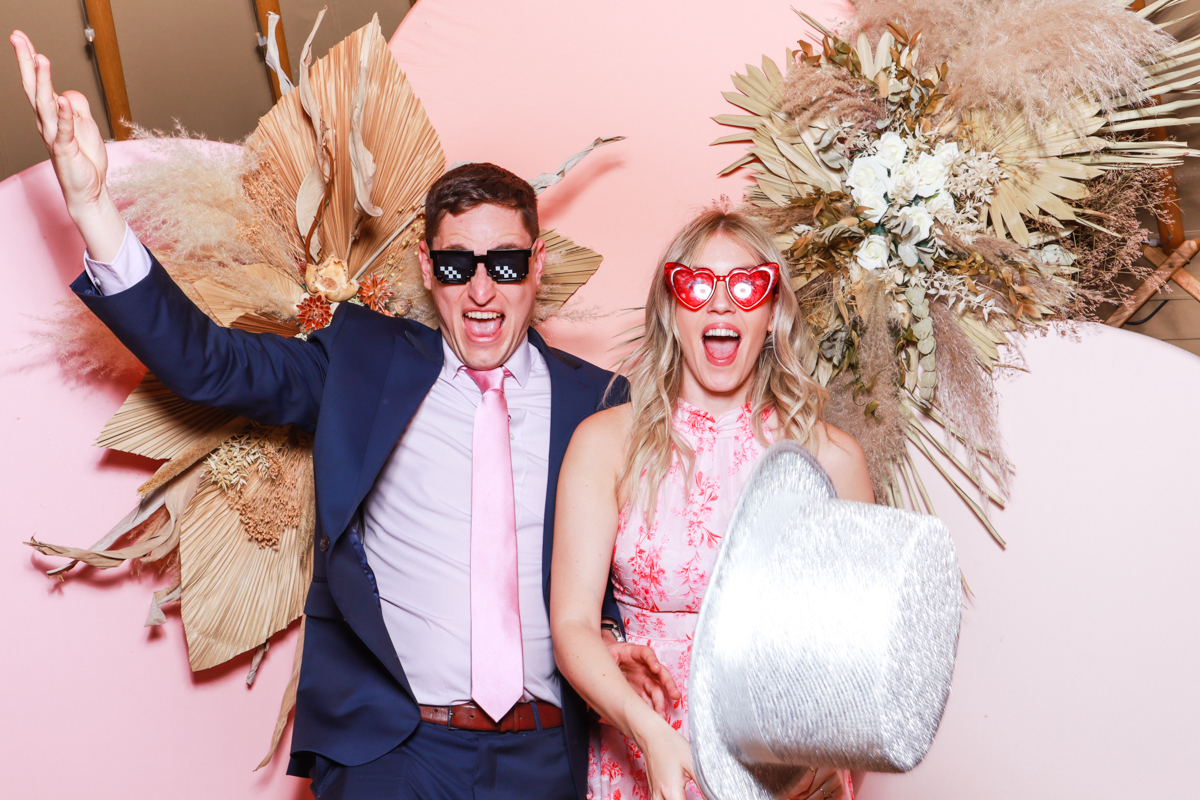 fun photo booth pictures for a wedding party at cripps and co wedding venue