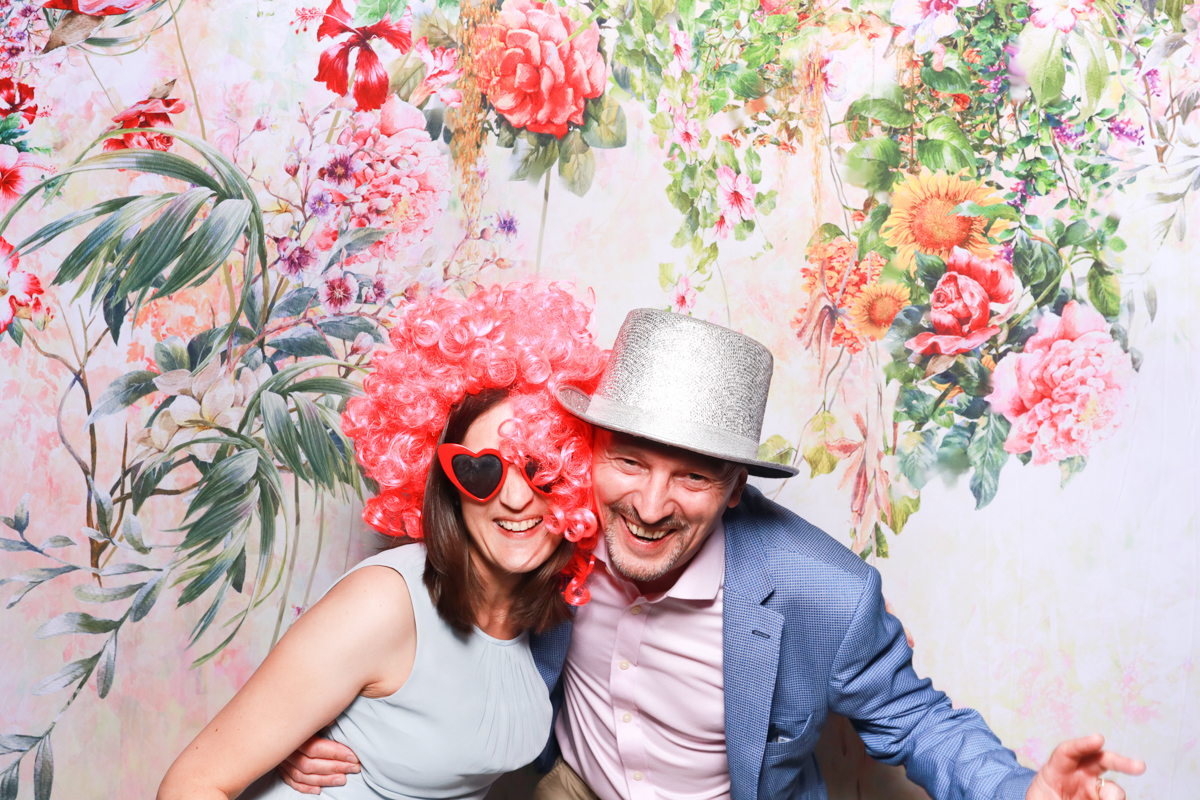 fun tropical backdrop for a wooden photo booth hire cotswolds