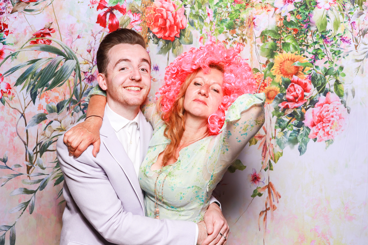 floral backdrop for stone barn cotswolds photo booth hire