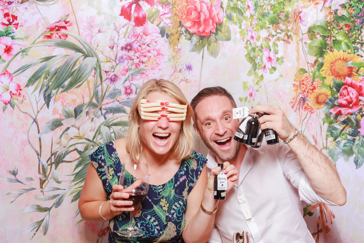 guests using the cotswolds photo booth hire for a wedding in the slaughter