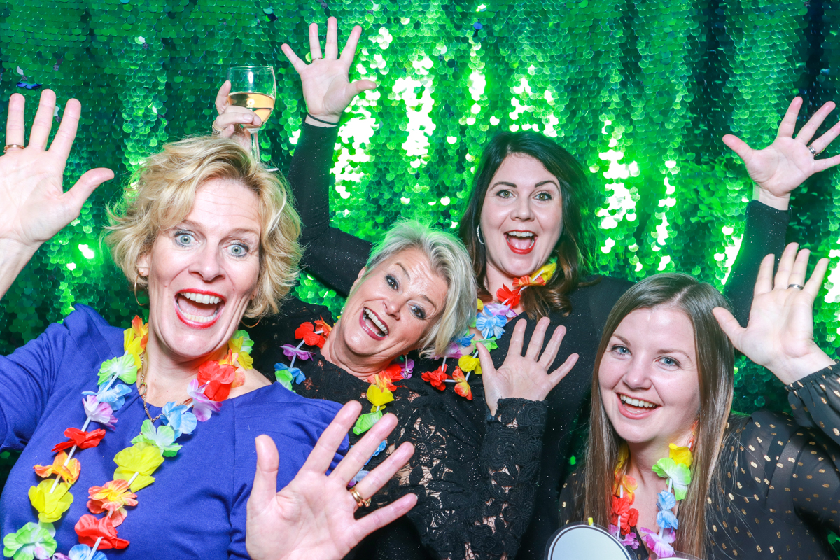 green sequins backdrop for corporate party photo booth
