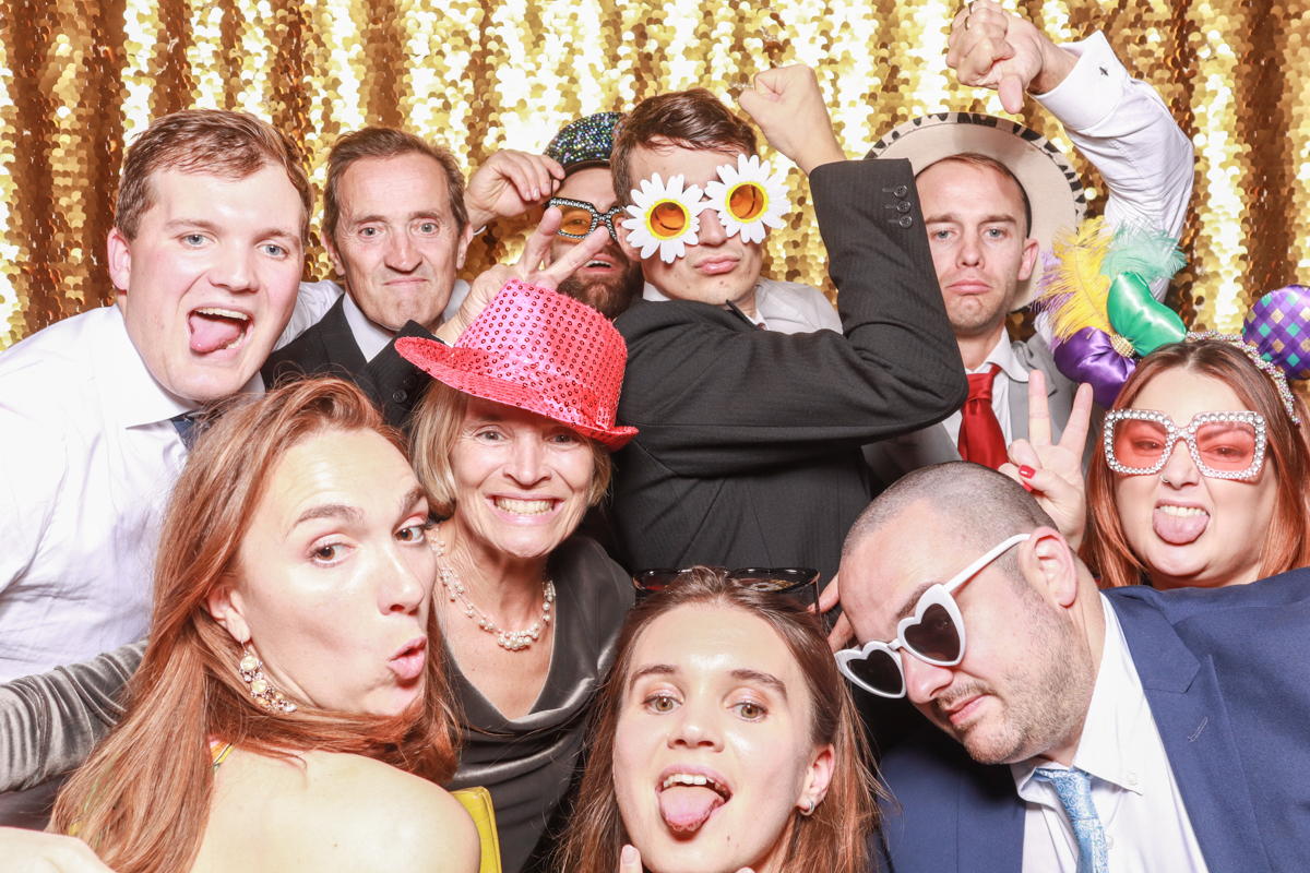guests having fun during a cotswolds photo booth rental