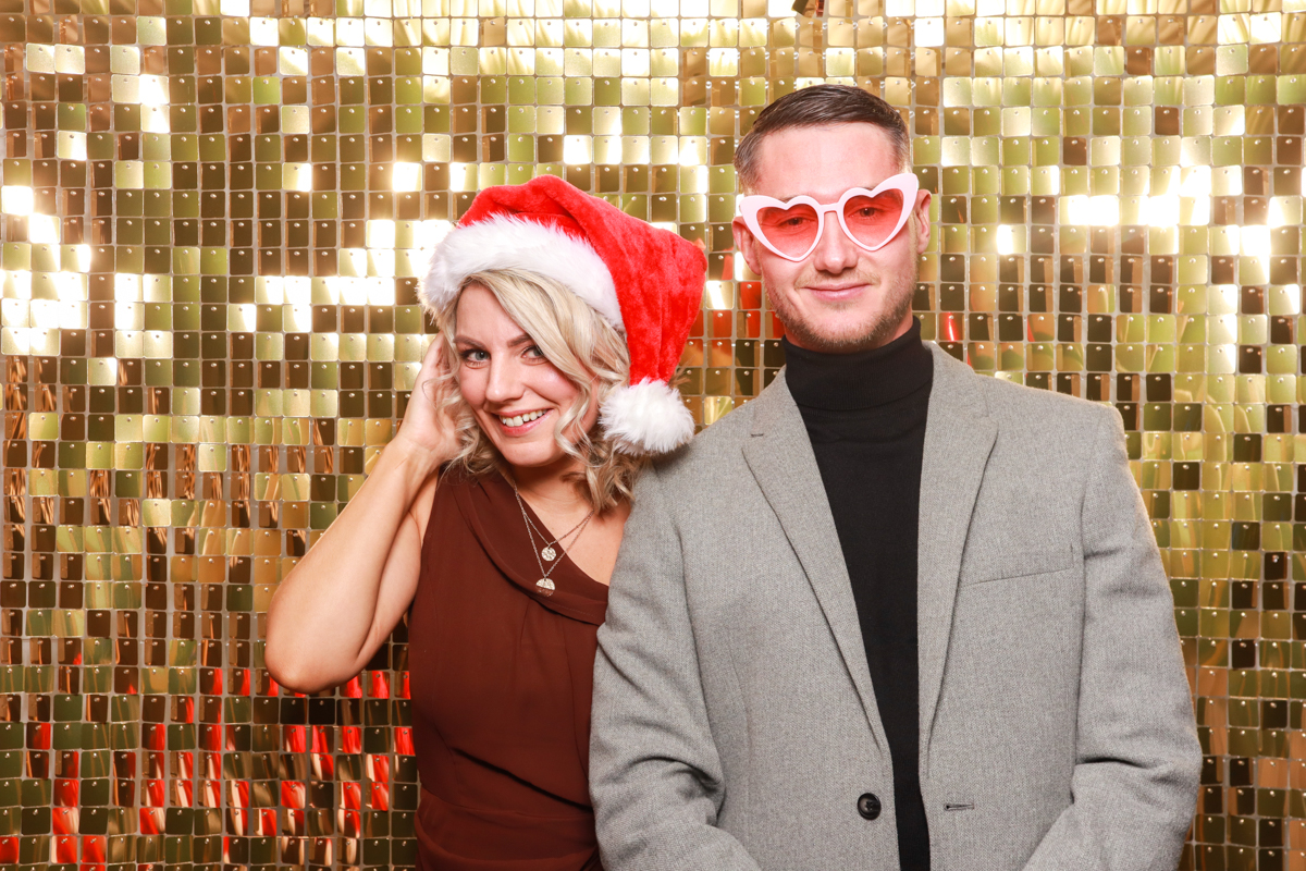 Golden shimmer wall for a Christmas corporate party entertainment