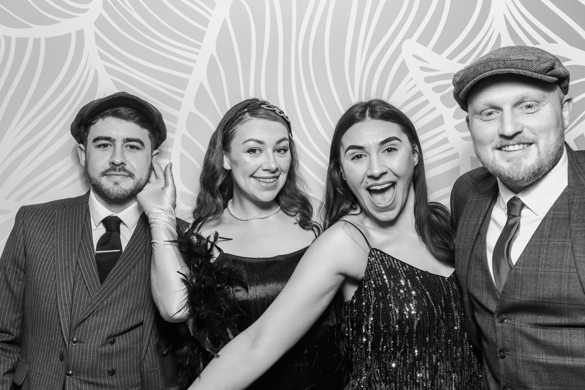 guests posing for a birthday party photo booth hire