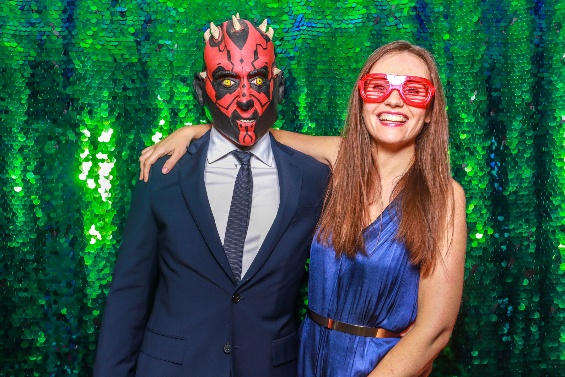 green sequins backdrop for a star wars themed wedding day at the great tythe barn cotswolds
