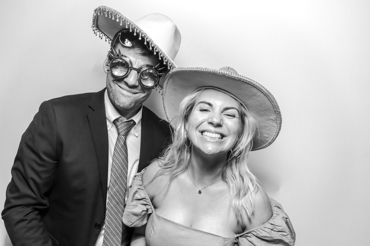 fun wooden photo booth hire with a black and white filter and prints at hyde house
