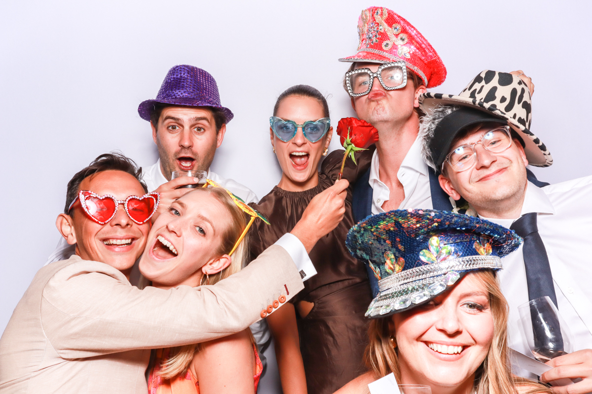 guests wearing fun props during a Cotswolds wedding at norton grounds