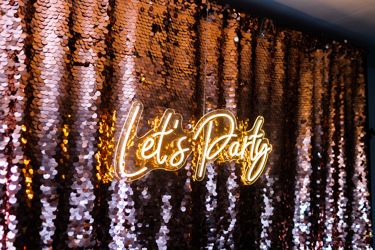 Let's party warm white custom neon sign to hire or to order for weddings and corporate events