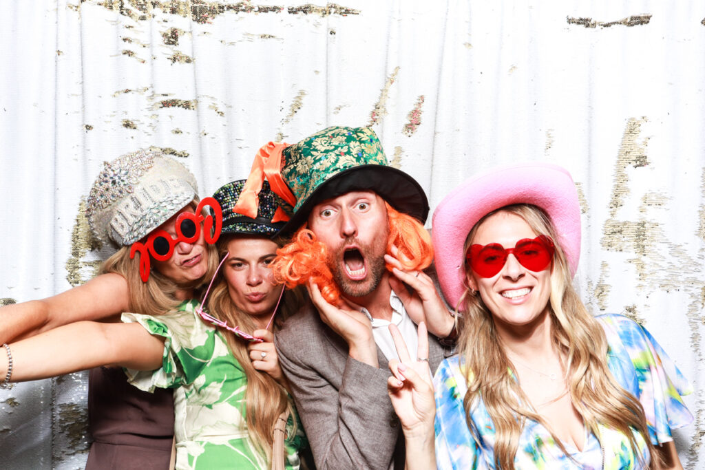 white and gold sequins backdrop for a wedding party entertainment during a photo booth hire 