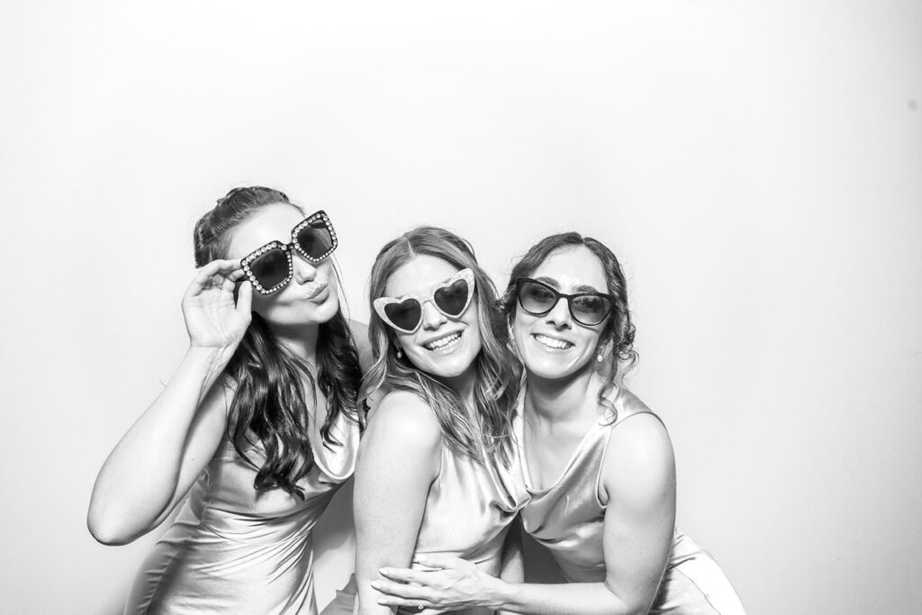 3 guests during a corporate event for mad hat photo booth rental 