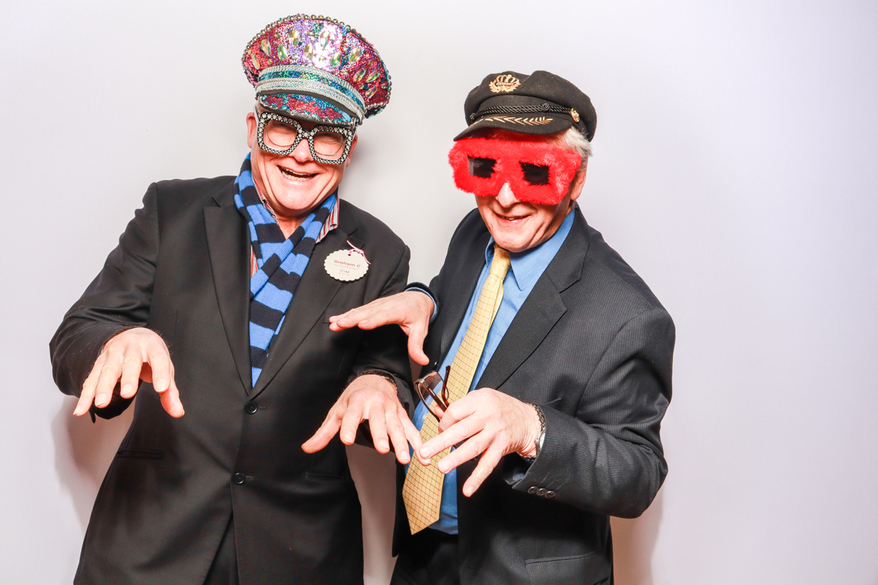 2 guests during a corporate event photo booth rental entertainment