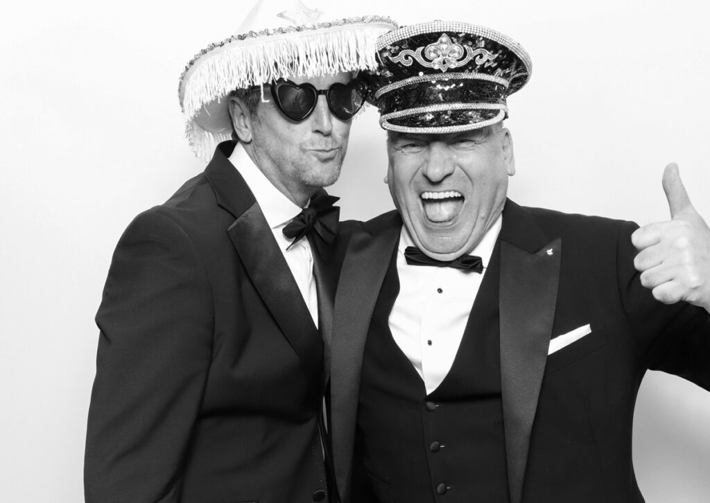 black and white image from a corporate event with mad hat photo booth hire helping with the Event Marketing : Boosting Brand Awareness at Corporate Events