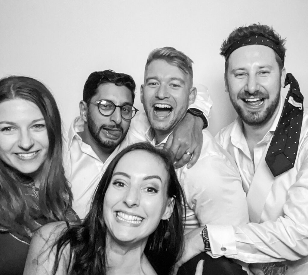 b&w image of guests during a selfie pod hire for a small intimate wedding
in cheltenham
