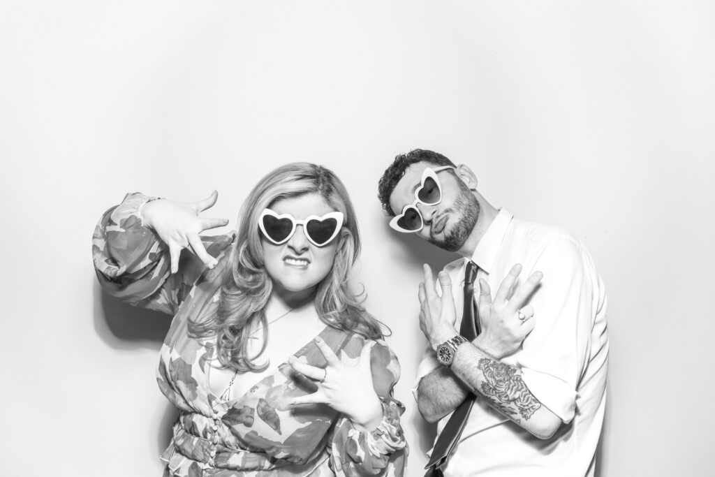 couple posing with a b&w filter for kardashian style selfie pod hire for a cheltenham photo booth hire affordable party entertainment